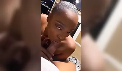 Fat ebony stripper shows her saggy tits and gives a BJ