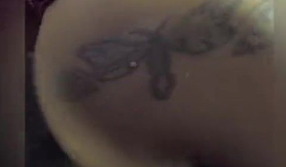 Redheaded ebony whore taking a doggy pounding