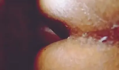 Redheaded ebony whore taking a doggy pounding