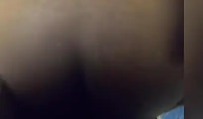 Redheaded ebony whore taking a doggy pounding