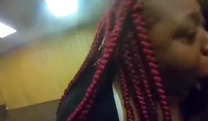 Redheaded ebony whore taking a doggy pounding