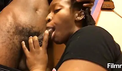 African nympho blows a huge meat pole & takes a facial