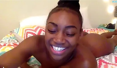 Sexy ebony Camsoda model strips & massages her pussy