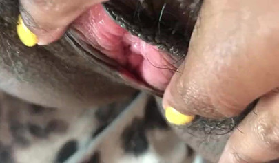 Slutty ebony rubbing her hairy muff up close