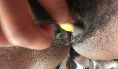 Slutty ebony rubbing her hairy muff up close