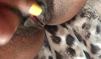 Slutty ebony rubbing her hairy muff up close