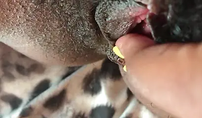 Slutty ebony rubbing her hairy muff up close