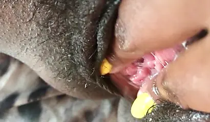 Slutty ebony rubbing her hairy muff up close