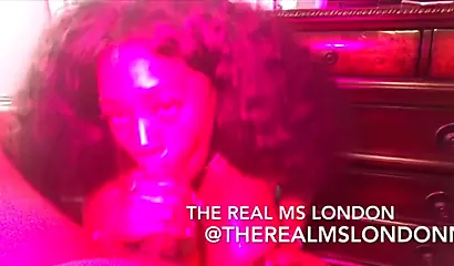 Busty curly-haired ebony strips and blows a strong black dick