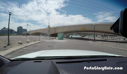 Insatiable ebony teen sucks white wiener through a gloryhole