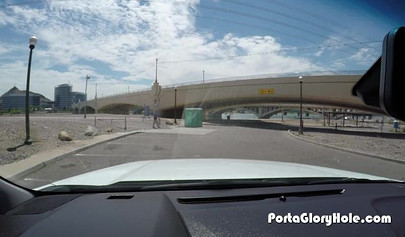 Insatiable ebony teen sucks white wiener through a gloryhole