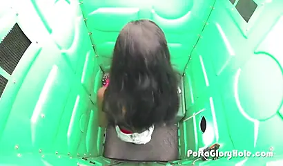 Insatiable ebony teen sucks white wiener through a gloryhole