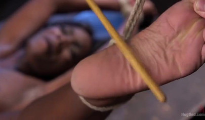 Skinny ebony Ana Foxxx gets humiliated & toyed while bound