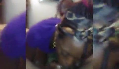 Afro-American nympho blowing a massive meat pole