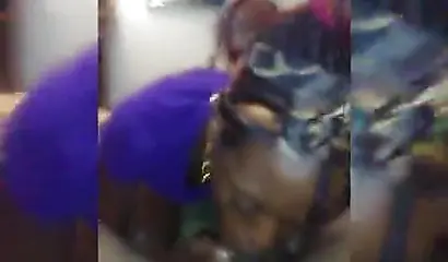 Afro-American nympho blowing a massive meat pole