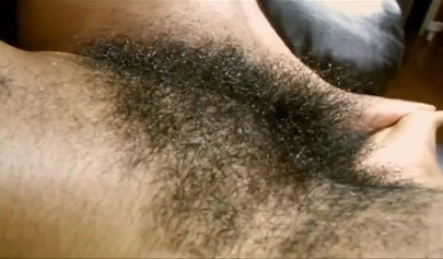 Cute ebony teen spreads her super hairy vagina