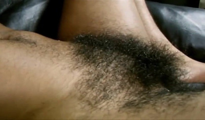 Cute ebony teen spreads her super hairy vagina