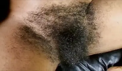 Cute ebony teen spreads her super hairy vagina