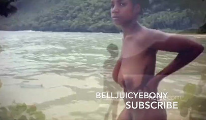 Marvelous Caribbean doll shows off her big tits and ass while going for a swim