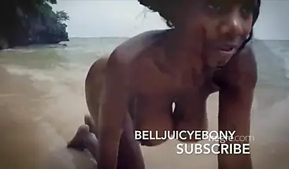 Marvelous Caribbean doll shows off her big tits and ass while going for a swim