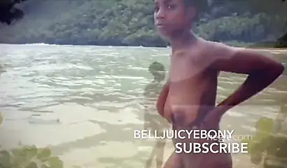 Marvelous Caribbean doll shows off her big tits and ass while going for a swim