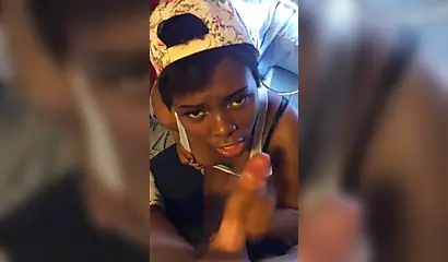 Cute Afro-American babe sucking my white dick in POV