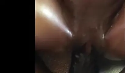 Ebony in sexy over-the-knee socks riding a huge meat pole