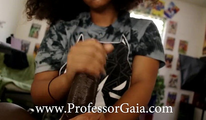 Curly-haired ebony strokes & blows a giant black dick