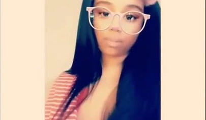 Sexy ebony goddess teases with her curves in a solo