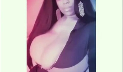 Sexy ebony goddess teases with her curves in a solo