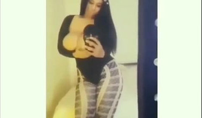 Sexy ebony goddess teases with her curves in a solo