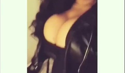 Sexy ebony goddess teases with her curves in a solo