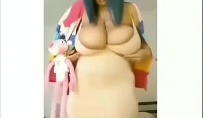 Sexy ebony goddess teases with her curves in a solo