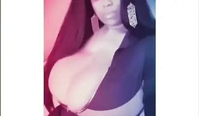 Sexy ebony goddess teases with her curves in a solo