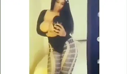 Sexy ebony goddess teases with her curves in a solo