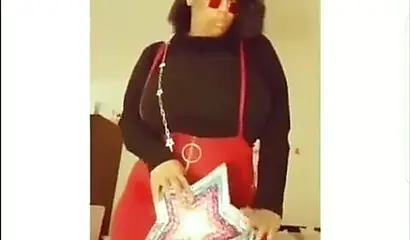 Sexy ebony goddess teases with her curves in a solo