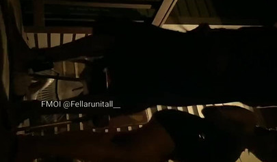Horny black couple having sex on the porch