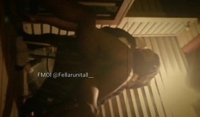 Horny black couple having sex on the porch