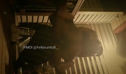 Horny black couple having sex on the porch