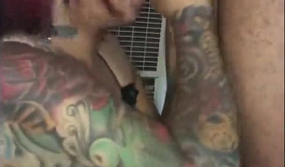 Redheaded ebony slut Caramel Chaun shows off her cock sucking skills