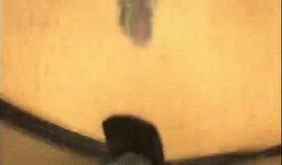 Redheaded ebony slut Caramel Chaun shows off her cock sucking skills