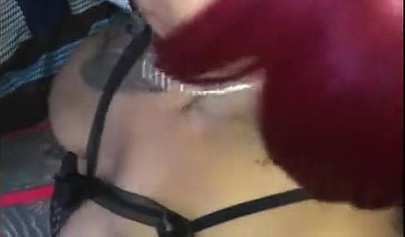 Redheaded ebony slut Caramel Chaun shows off her cock sucking skills