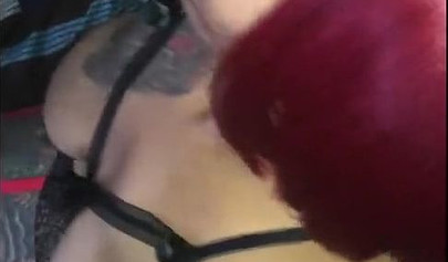 Redheaded ebony slut Caramel Chaun shows off her cock sucking skills