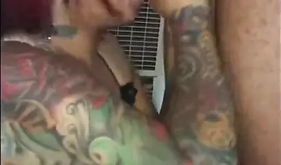 Redheaded ebony slut Caramel Chaun shows off her cock sucking skills