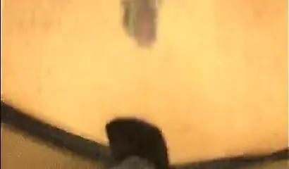 Redheaded ebony slut Caramel Chaun shows off her cock sucking skills