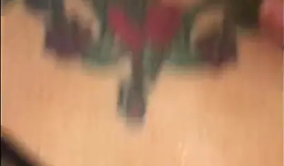 Redheaded ebony slut Caramel Chaun shows off her cock sucking skills