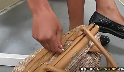 Busty black teen Sonia Roxxx sucks a white wiener through a gloryhole