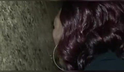 Nasty ebony slut blows a white dick through a gloryhole