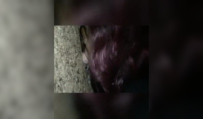 Nasty ebony slut blows a white dick through a gloryhole