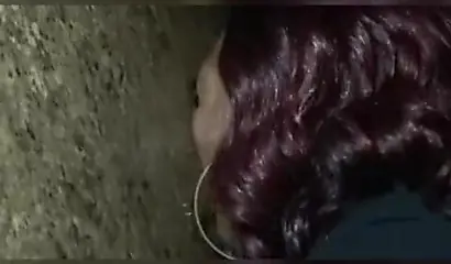 Nasty ebony slut blows a white dick through a gloryhole